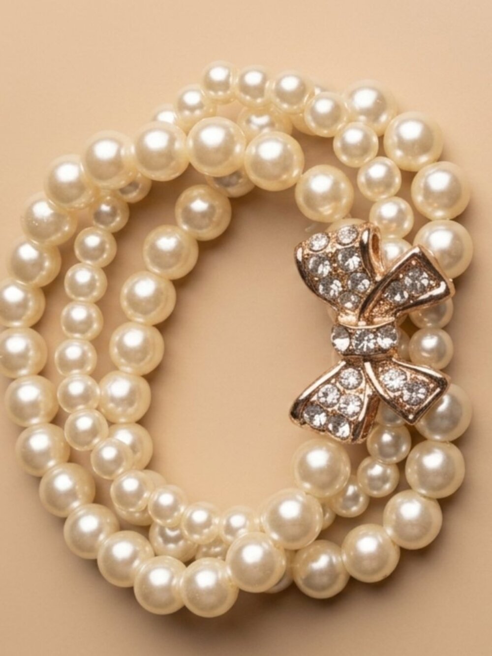 Three-Strand Pearl Bracelet with Crystal Bow Center - Picture 5 of 6
